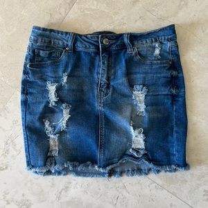 Wax blue denim distressed Jean skirt. Size large.